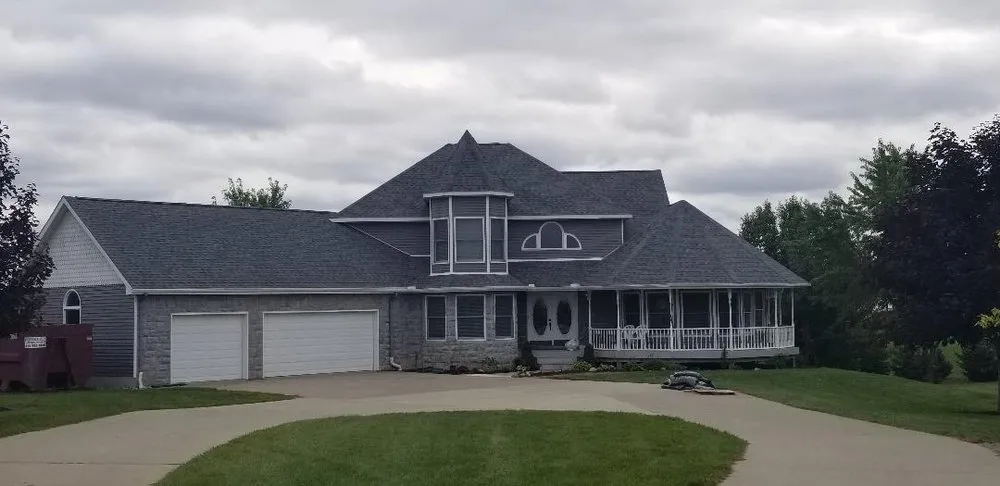 Professional roof leak repair after storm damage in Columbiaville, MI by Stratton Home Improvement