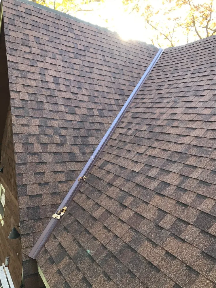Slide of Straw Hat Roofing And Construction