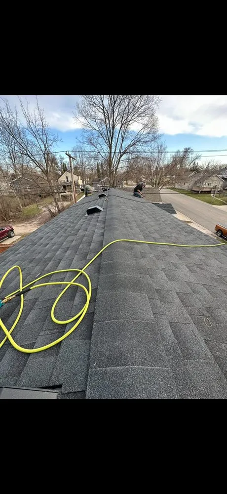 Slide of Straw Hat Roofing And Construction