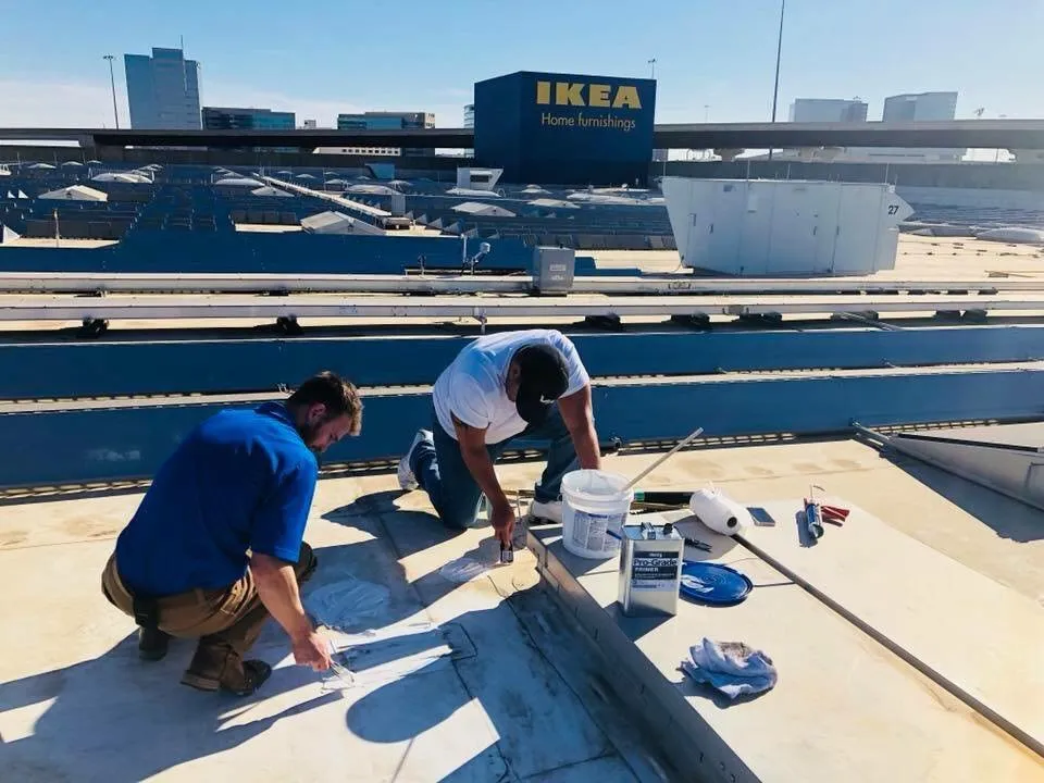 Slide of Striker Roofing & Construction