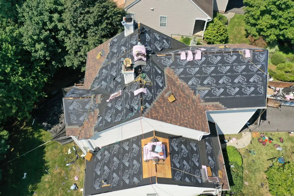 Slide of Strober Roofing and Maintenance