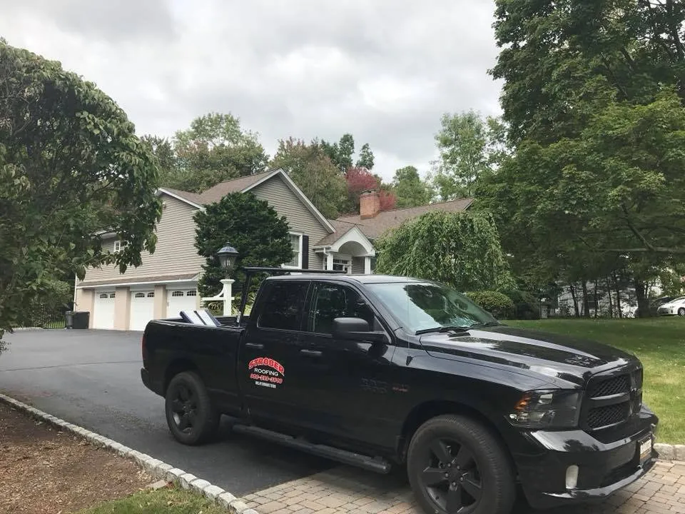 Slide of Strober Roofing and Maintenance