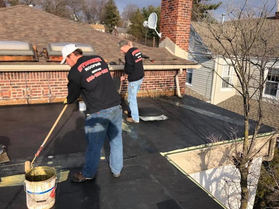 Slide of Strober Roofing and Maintenance