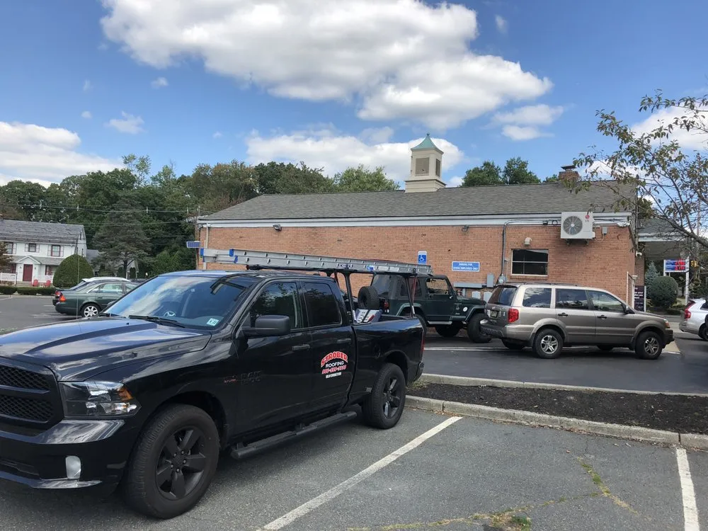 Slide of Strober Roofing and Maintenance