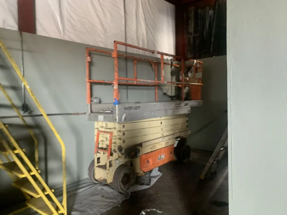 Slide of Structrum Roofing and Construction