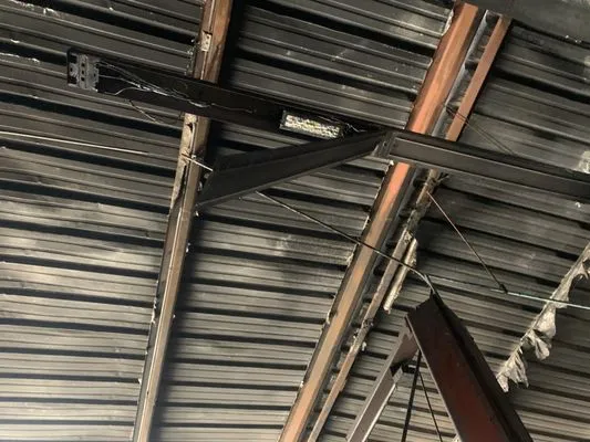 Structrum Roofing and Construction Logo