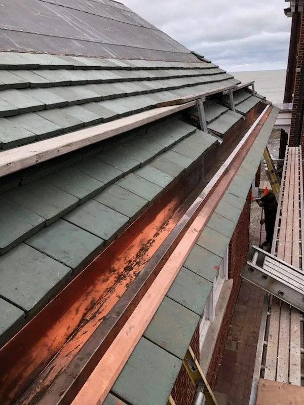 Slide of STS Roofing