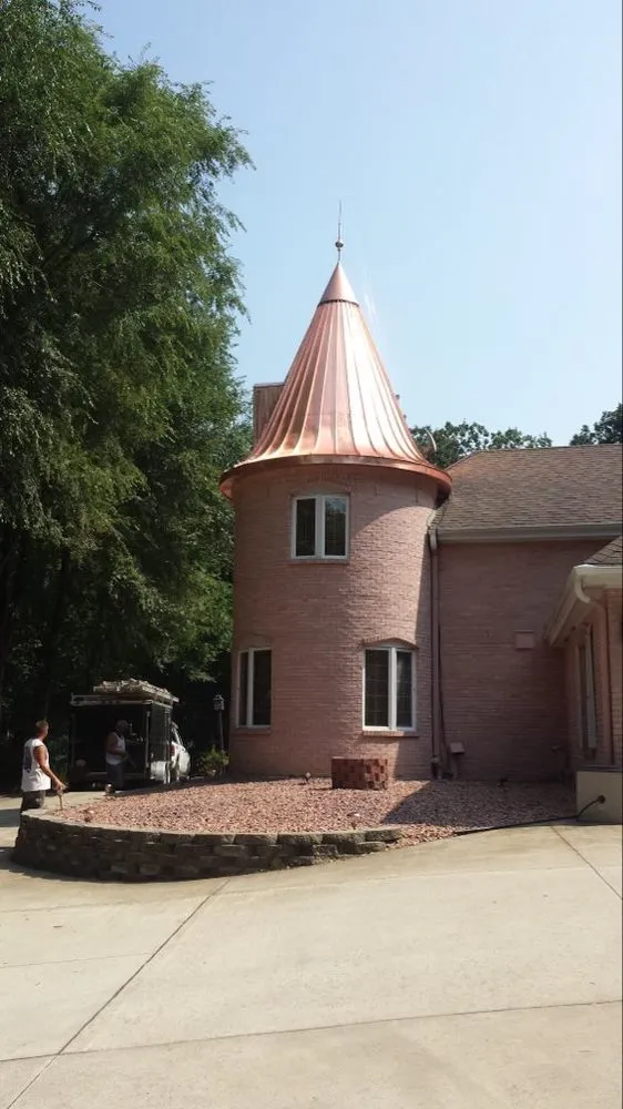 Slide of STS Roofing