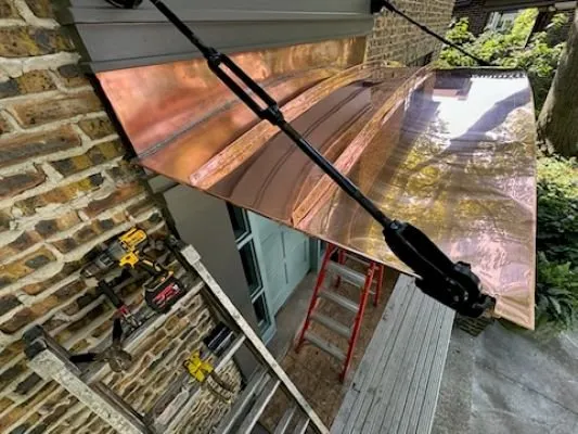 Slide of STS Roofing