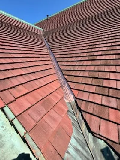 Slide of STS Roofing