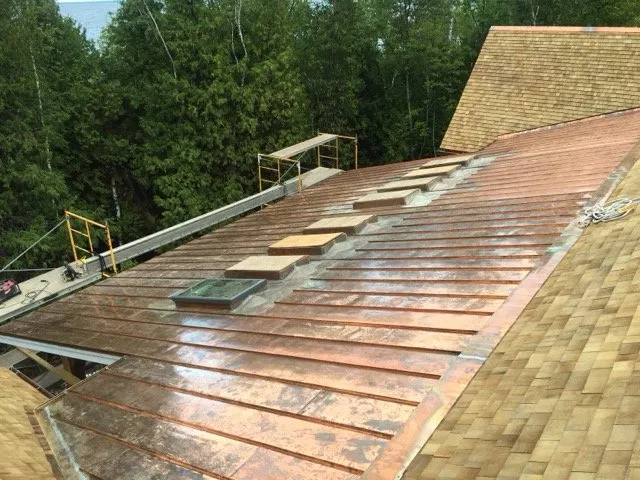 Slide of STS Roofing