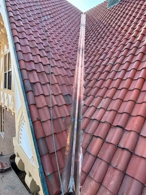 Slide of STS Roofing