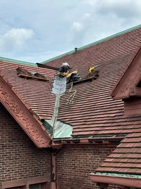 Slide of STS Roofing