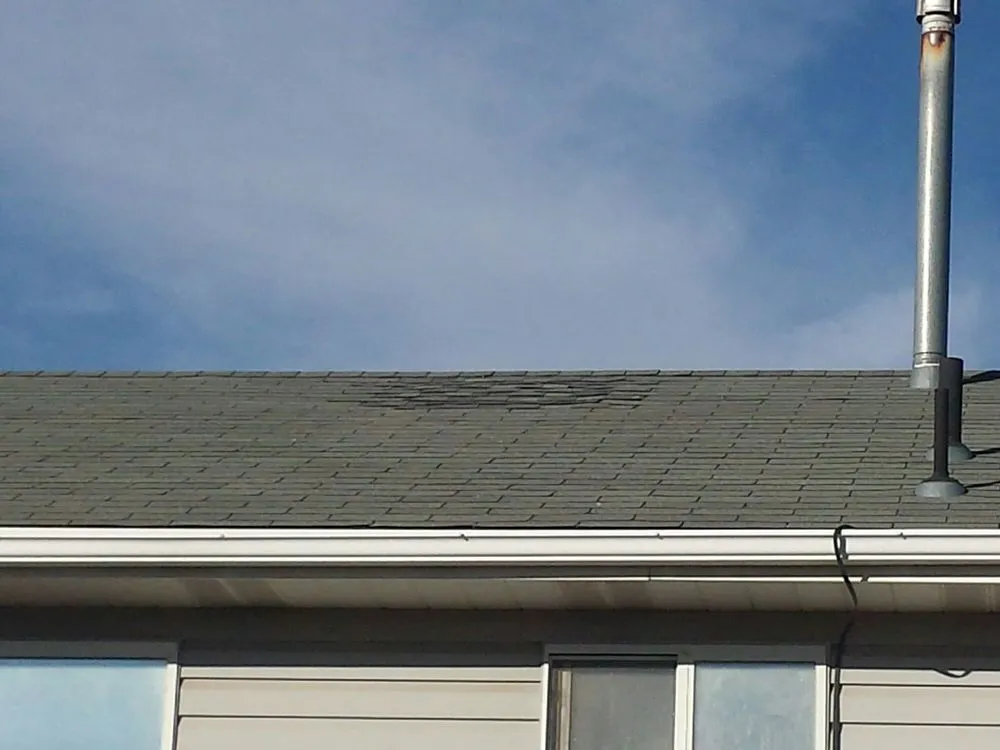 Slide of Stuart Roofing