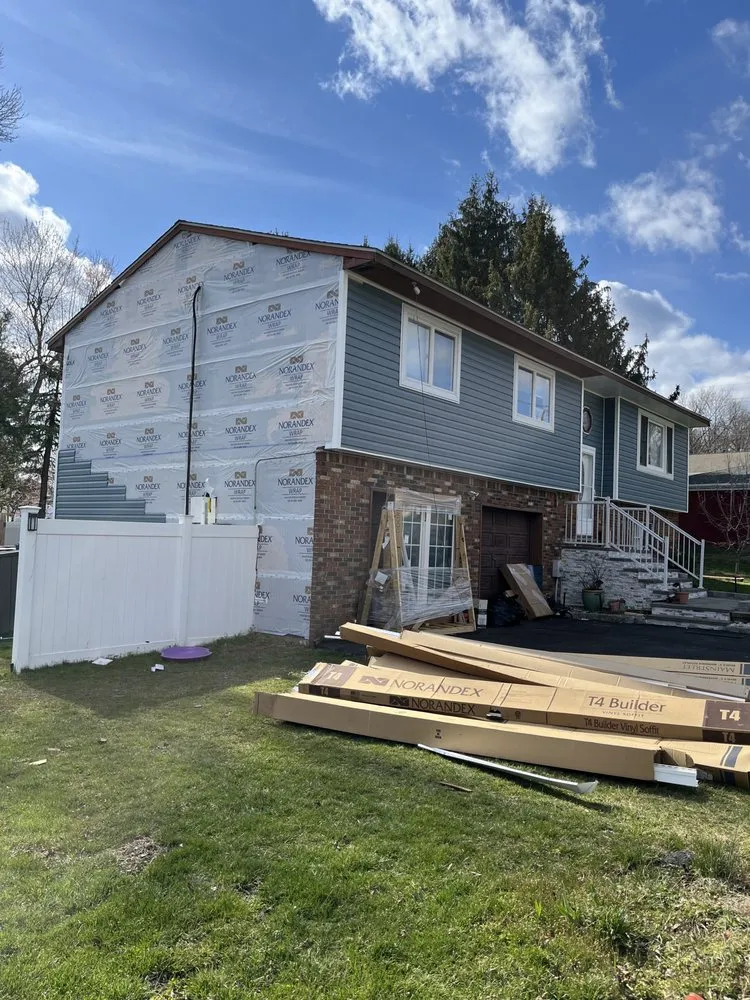 Licensed shingle roofing service with free inspection across Ewing Township, NJ - Stuart Roofing Siding & Gutters