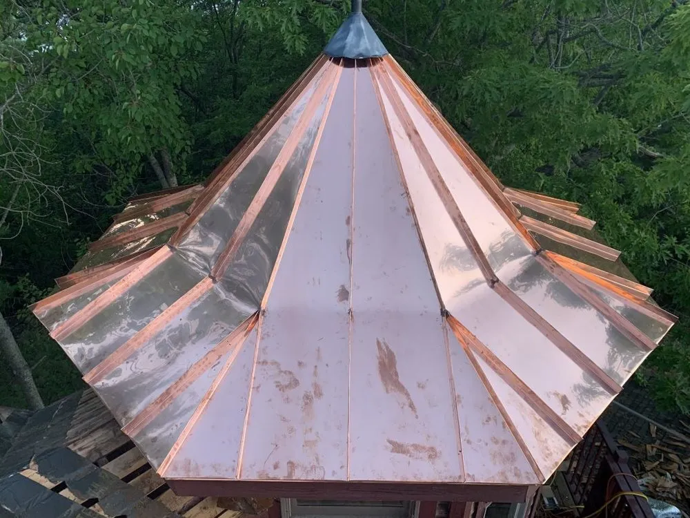Slide of Stump Metal Roofing