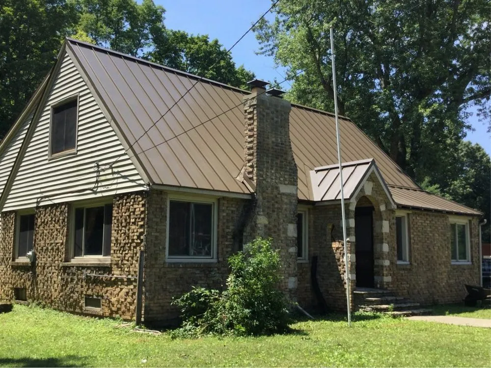 Slide of Stump Metal Roofing