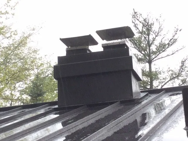 Slide of Stump Metal Roofing