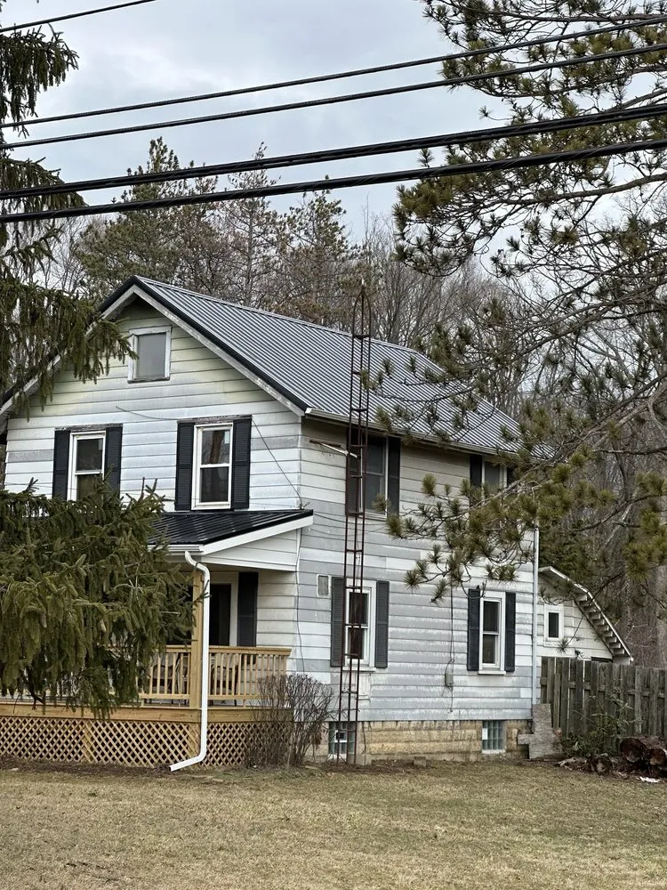 Emergency flat roof repair in Adario, OH by Stutzman Home Improvement