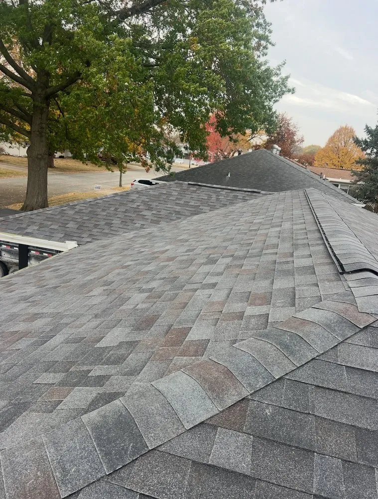 Slide of Stutzman Roofing and Construction