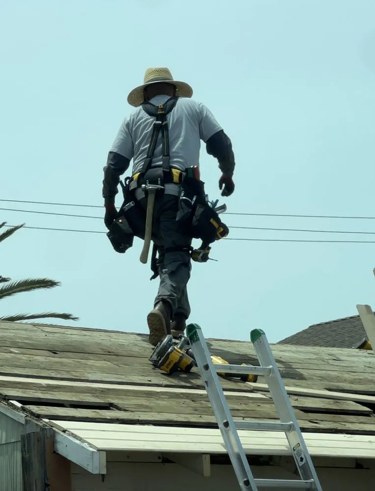 Slide of Suarez Roofing