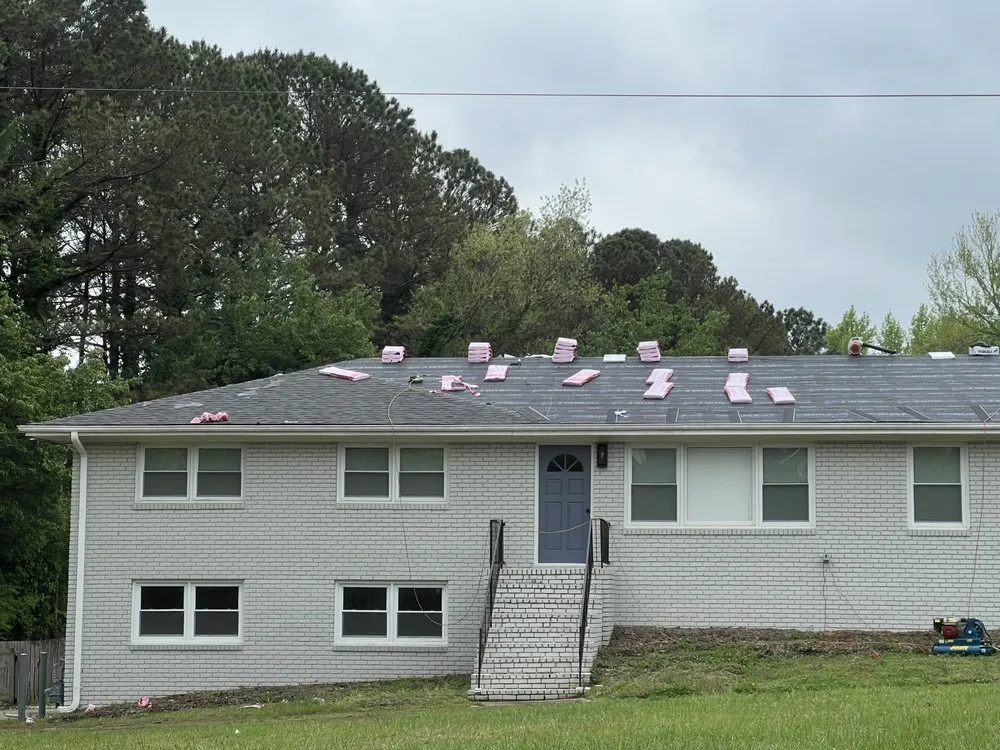 Slide of Suburban Roofing