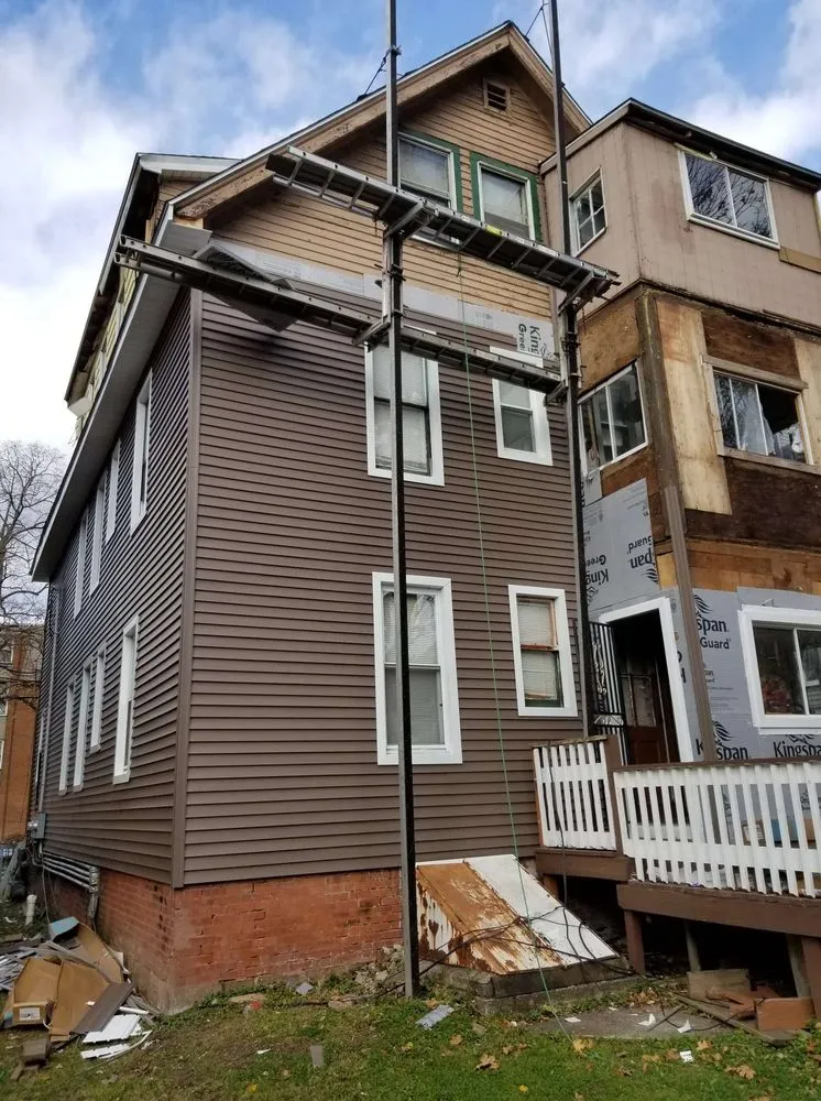 Slide of Suburban Roofing