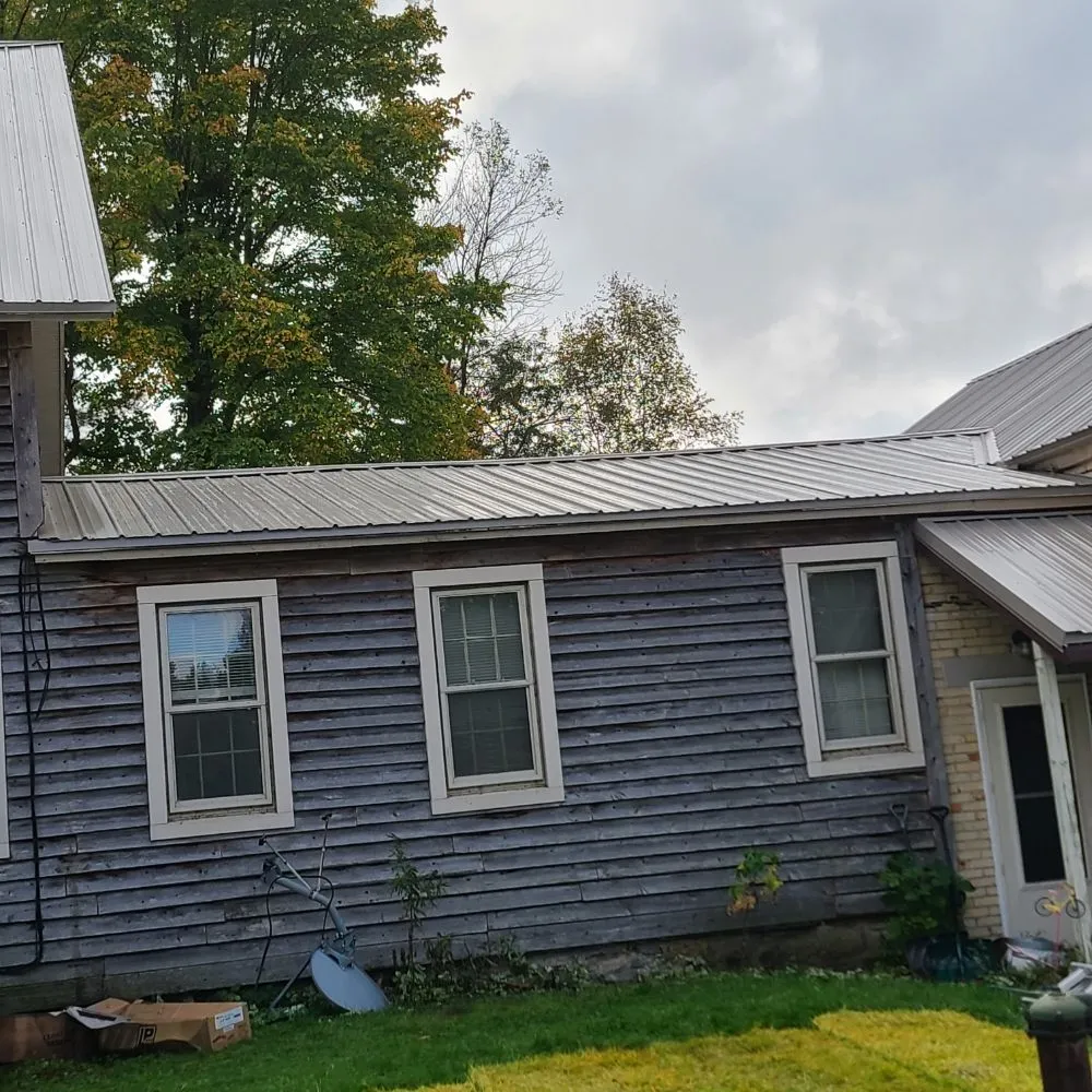 Slide of Suburban Steel Roofs