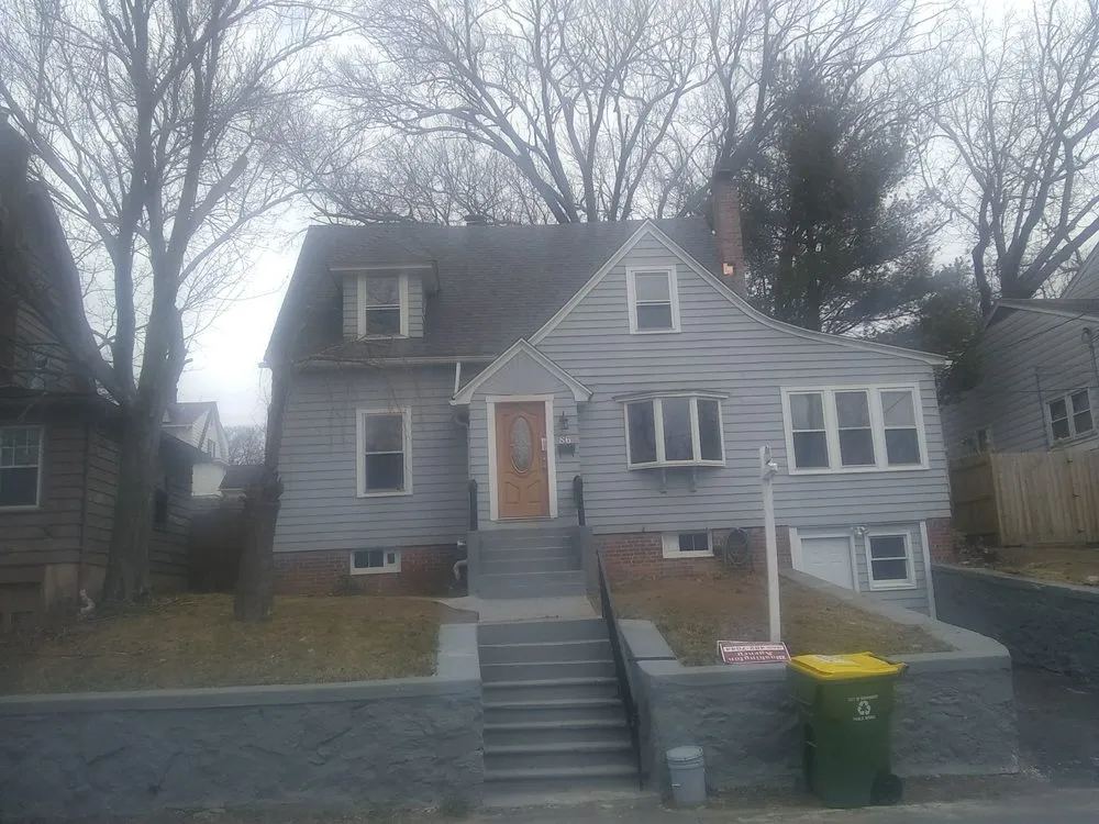 Slide of Sullivan Roofing