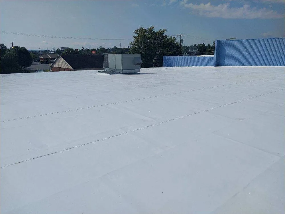 Professional roof leak repair in East Rochester, OH by Summit Commercial Solutions