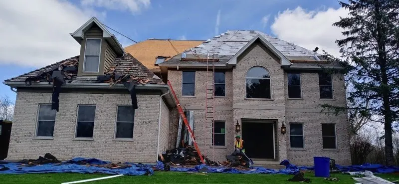 Professional roof replacement after storm damage across Village of Lakewood, IL - Summit Roofing