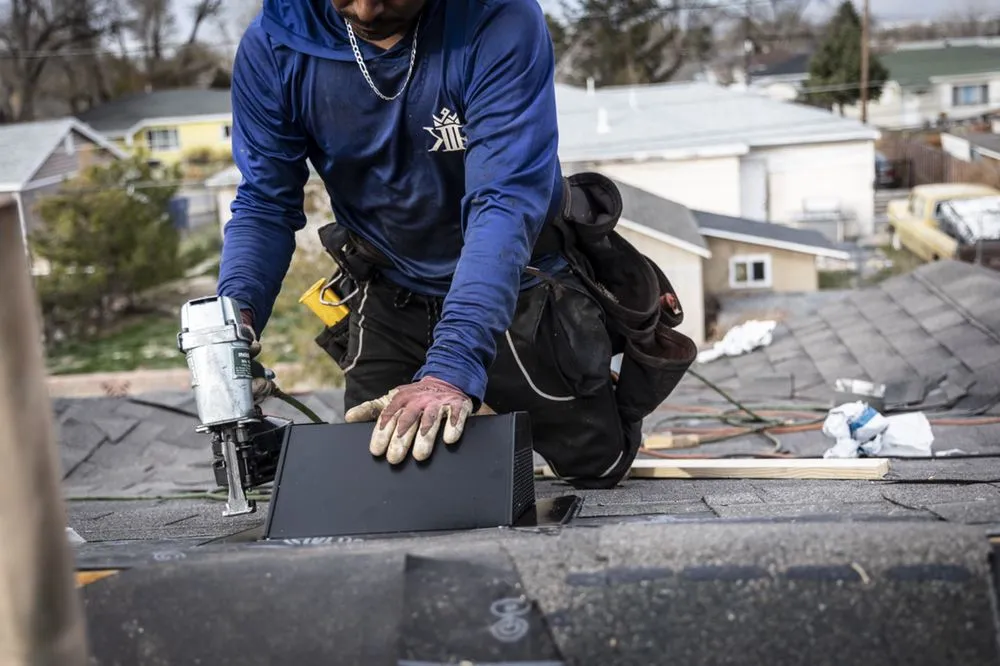 Slide of Sundance Roofing Company