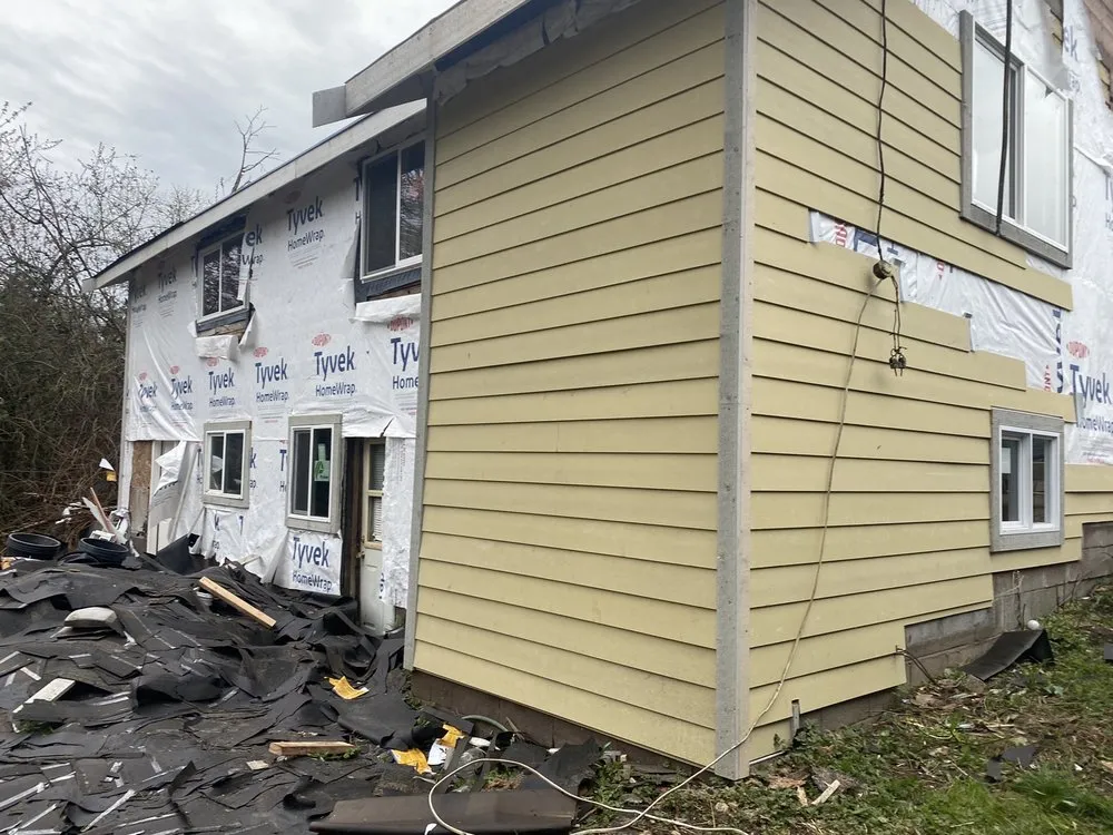 Slide of Sunnys roofing