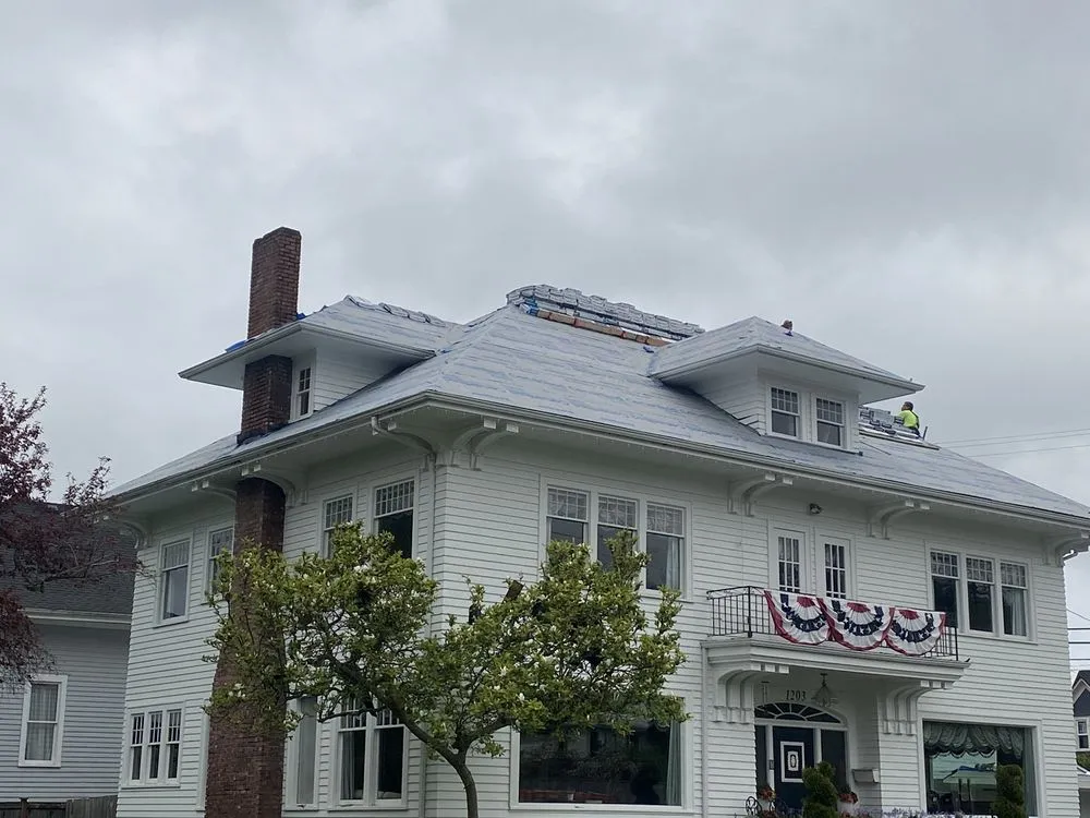 Slide of Sunnys roofing