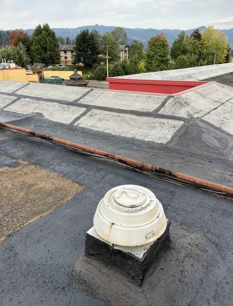 Slide of Sunnyside Pacific Roofing