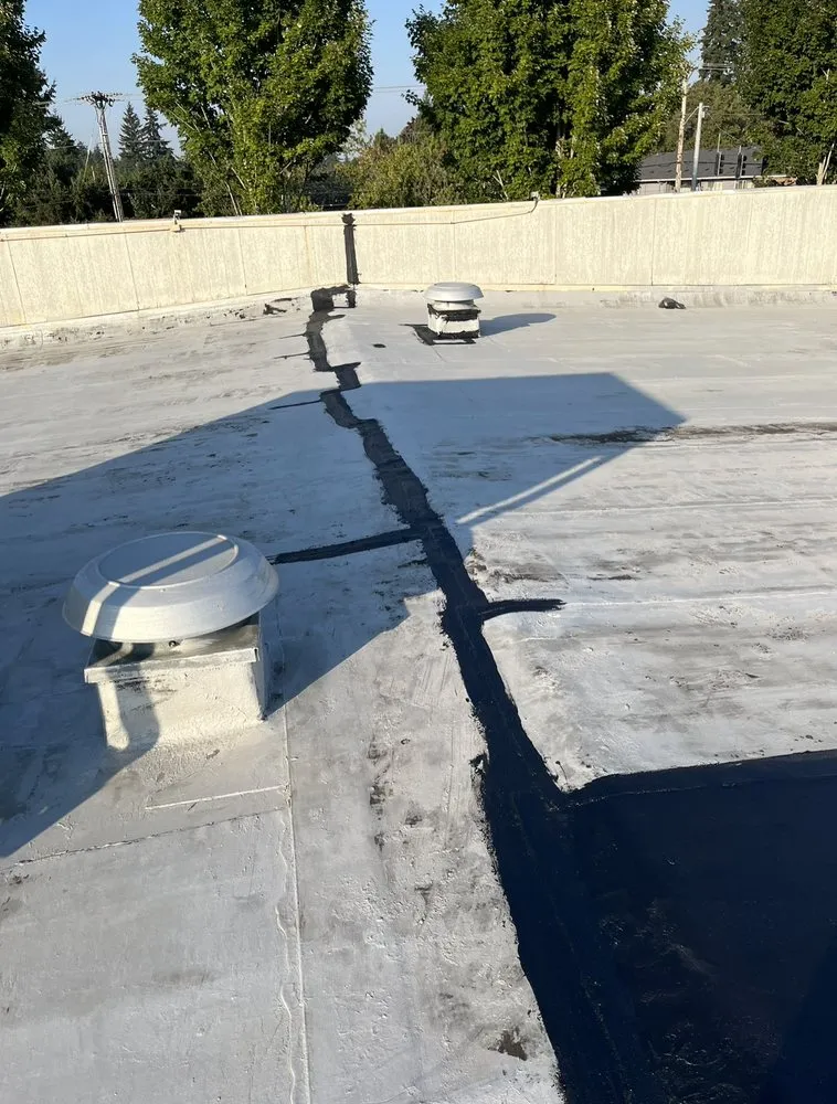 Slide of Sunnyside Pacific Roofing