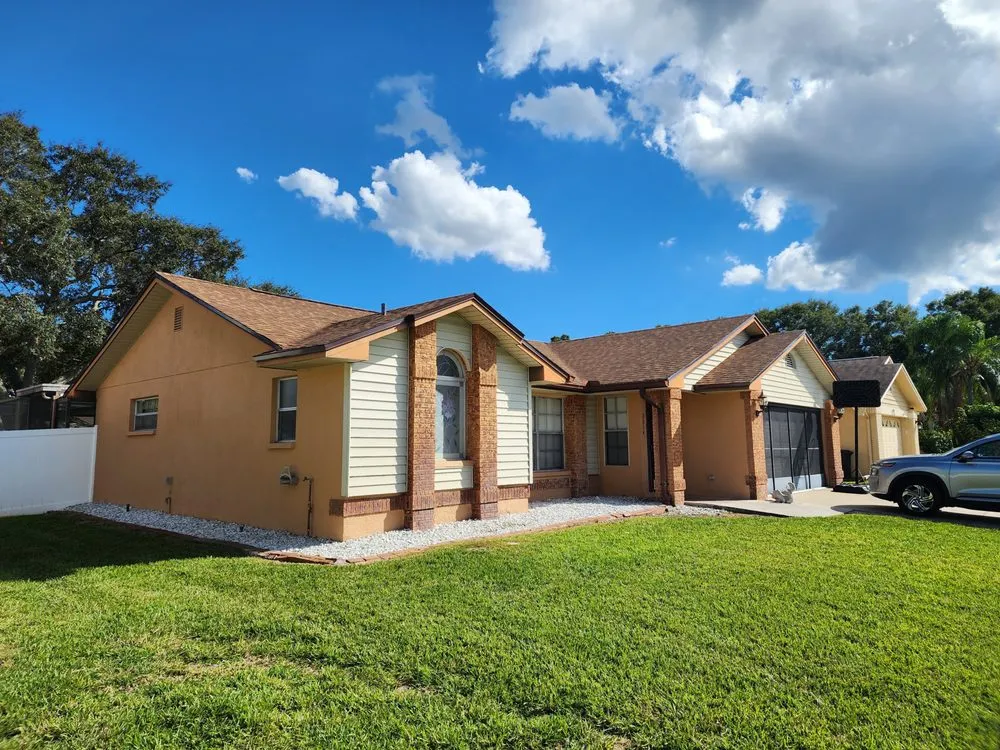 Licensed storm damage roof repair for homes in St. Petersburg, FL by Sunrise Contractors