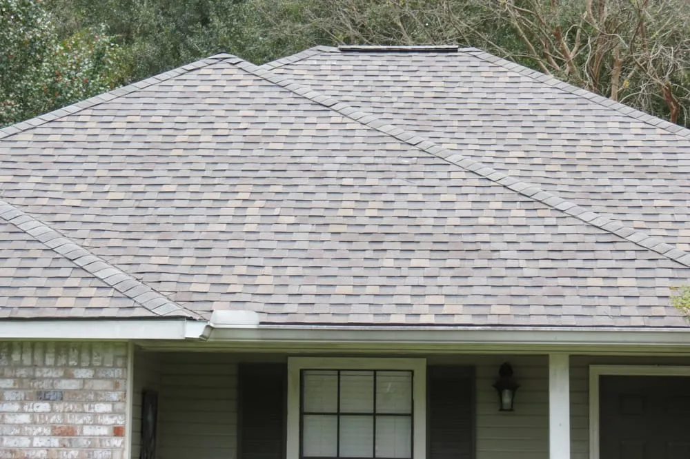 Local storm damage roof repair with free inspection in Greenwell Springs, LA by Sunrise Roofing & Construction