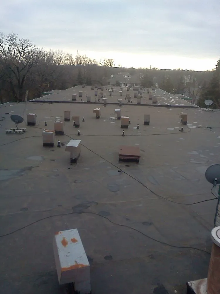 Slide of Sunrise Roofing Systems