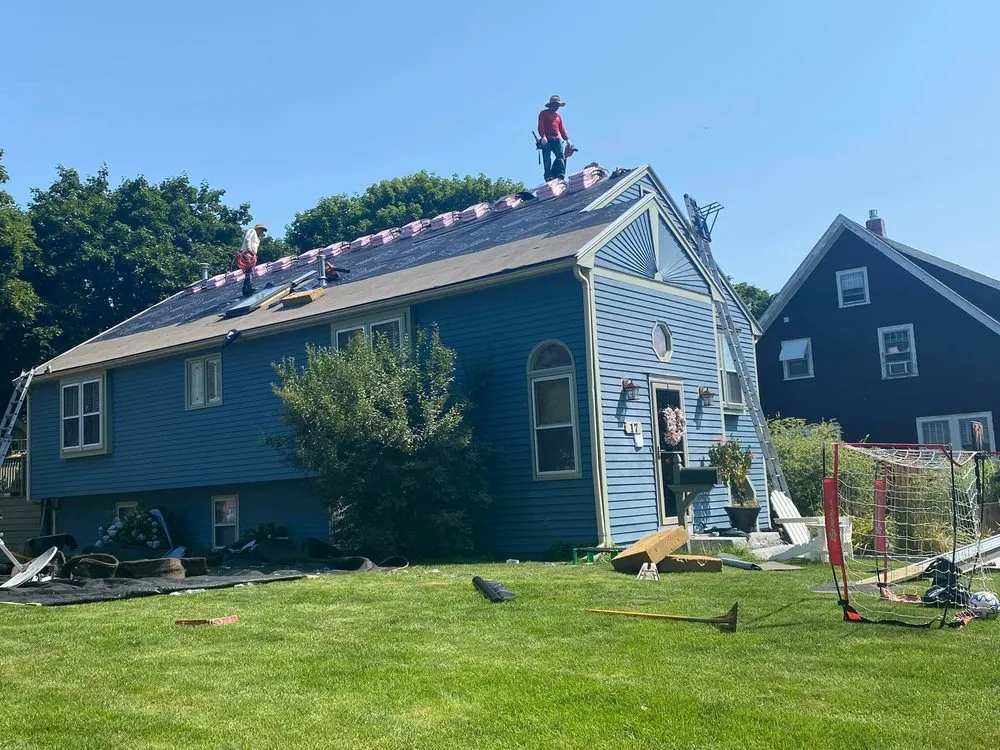 Professional storm damage roof repair in South Easton, MA by Sunset Home Improvement