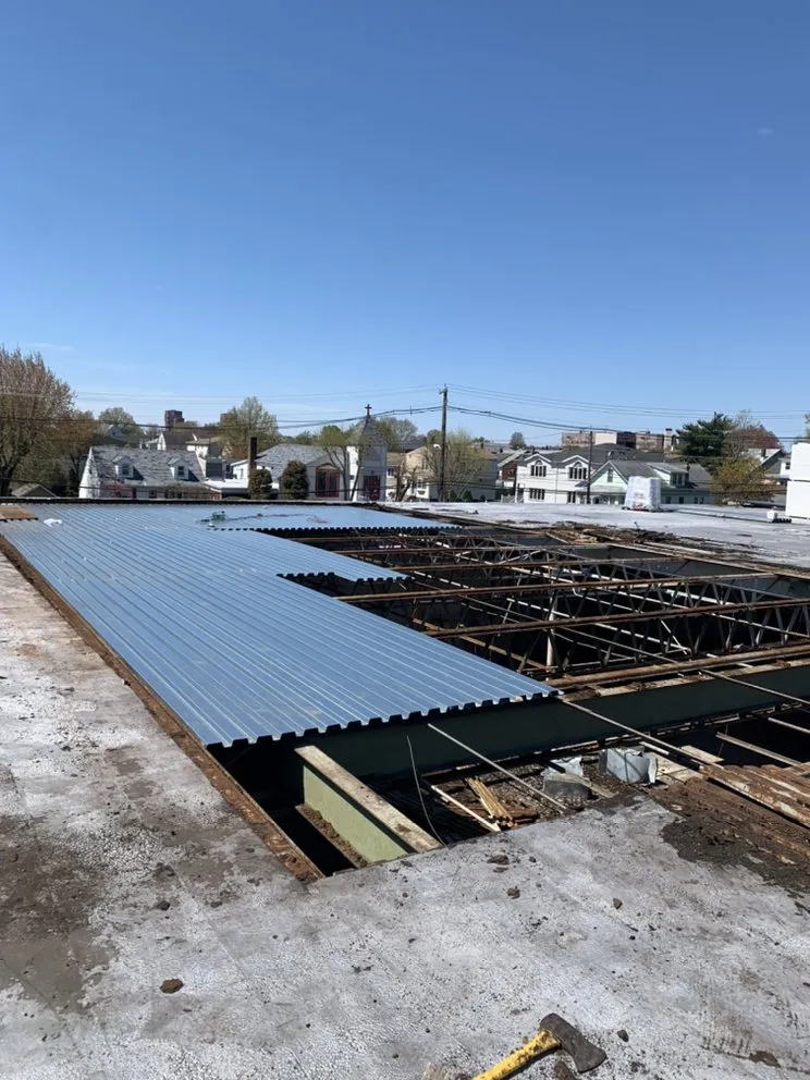 Professional storm damage roof repair in New York City, NY by Sunshine Restoration