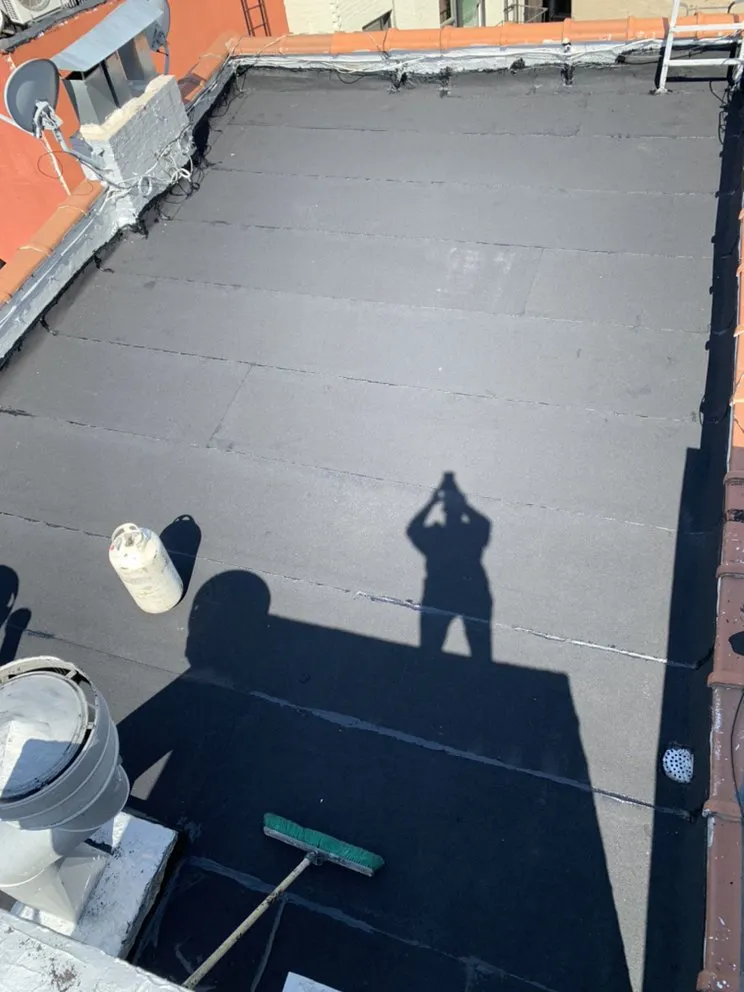 Expert storm damage roof repair in New York City, NY by Sunshine Restoration