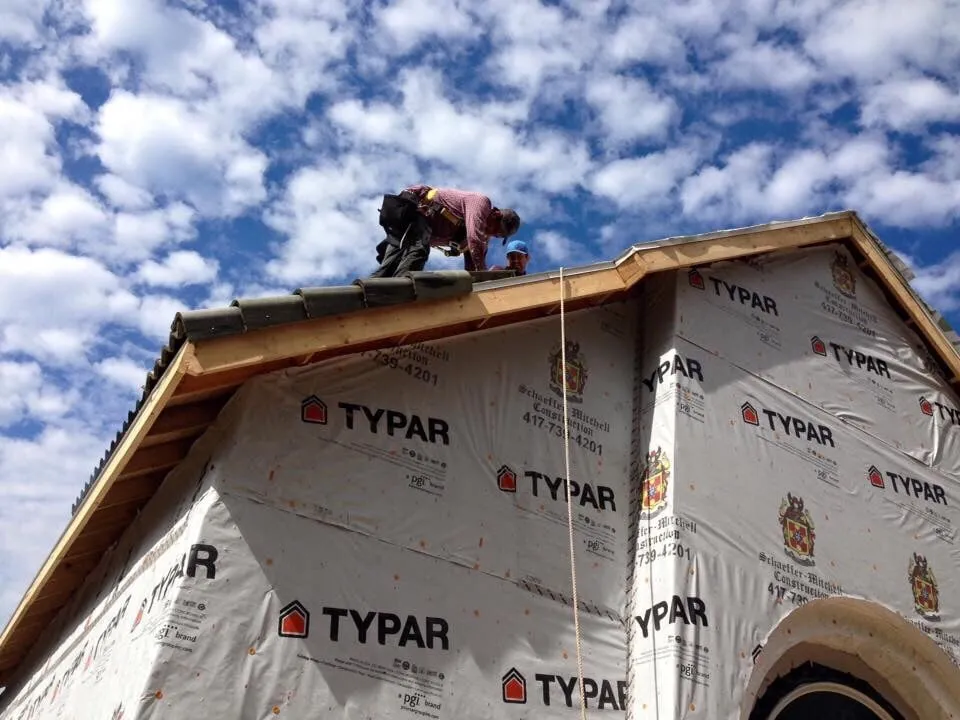 Slide of Sunshine Roofing