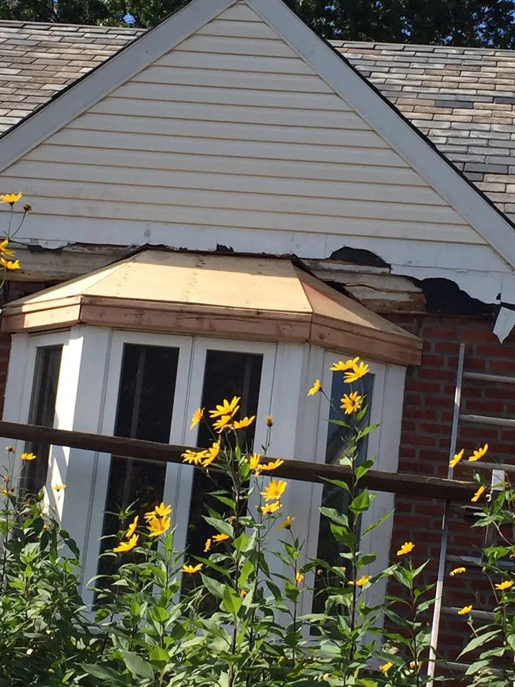 Top-rated roof repair for fast service in Flushing, NY by Superior Touch Roofing & Contracting