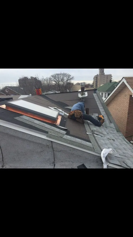 Emergency roof installation after storm damage across Flushing, NY - Superior Touch Roofing & Contracting