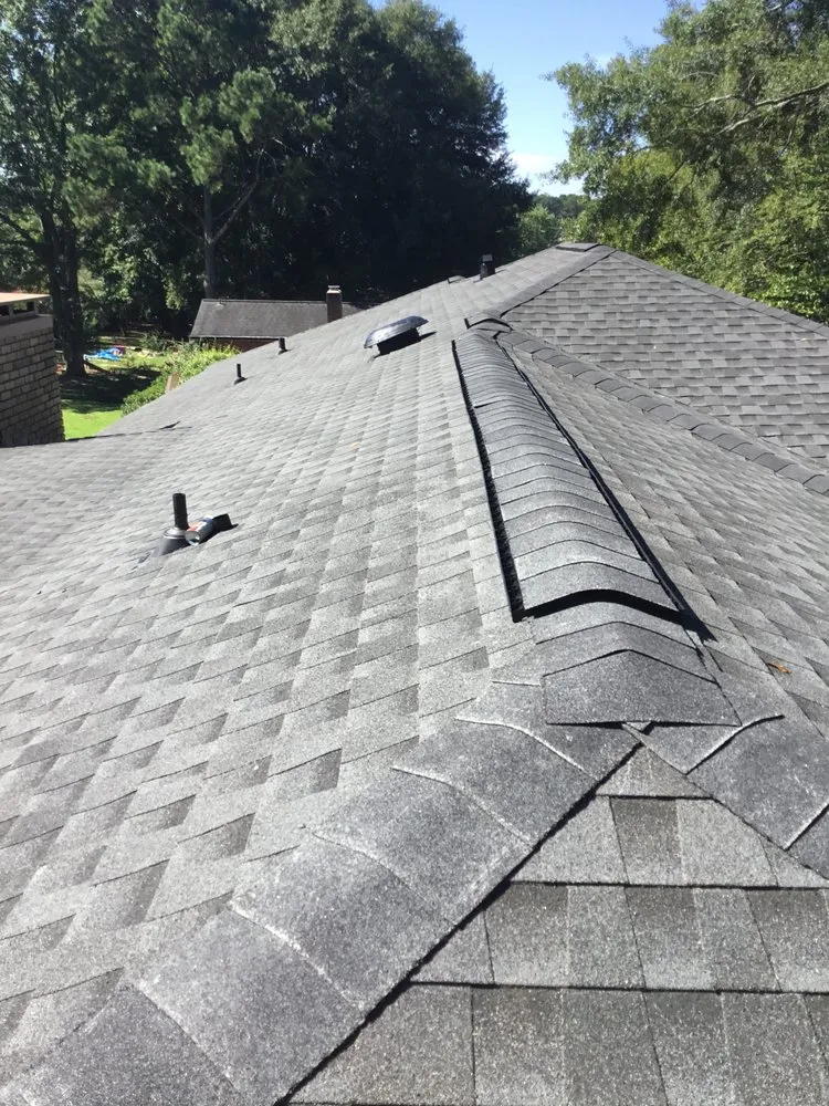 Slide of Supra Roofing