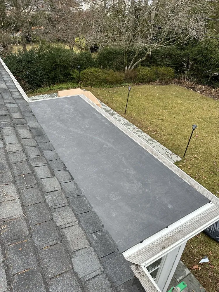 Slide of Supreme Island Roof Repair