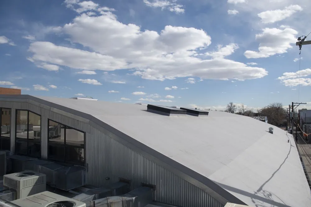 Slide of Supreme Roofing - Denver