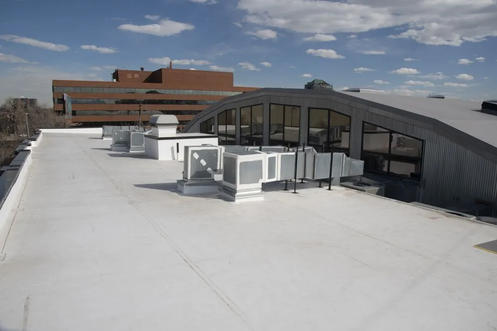 Slide of Supreme Roofing - Denver