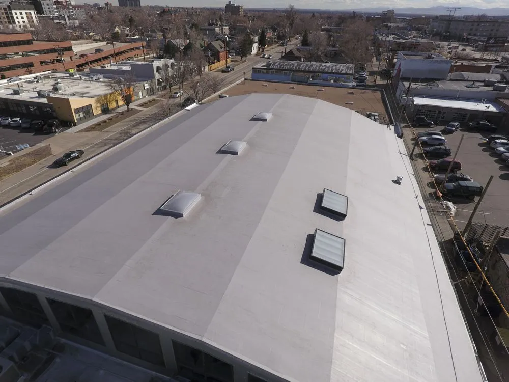 Slide of Supreme Roofing - Denver